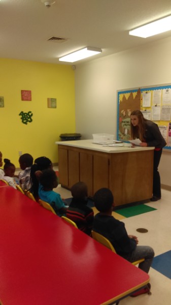 Speaking to the kids about food groups at headstart